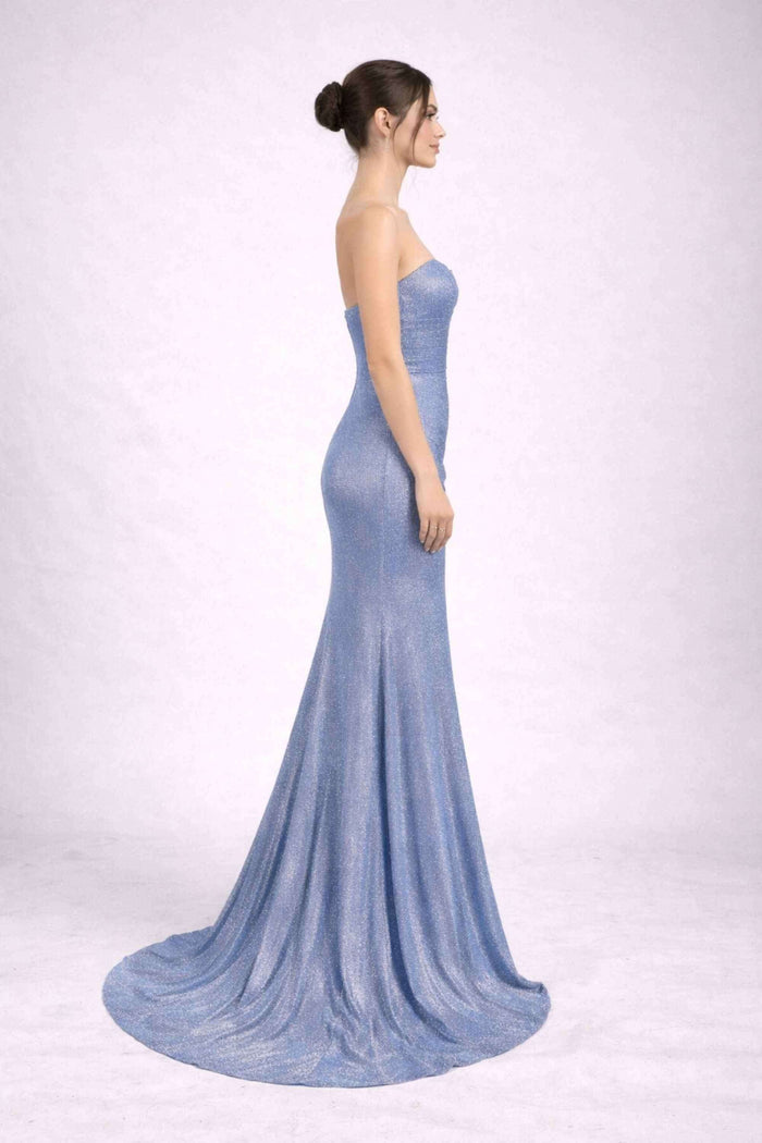 Side profile of Luna Dusty Blue Strapless Glitter Dress Jessica Stuart showcasing the elegant pleated design and glittery fitted fabric.