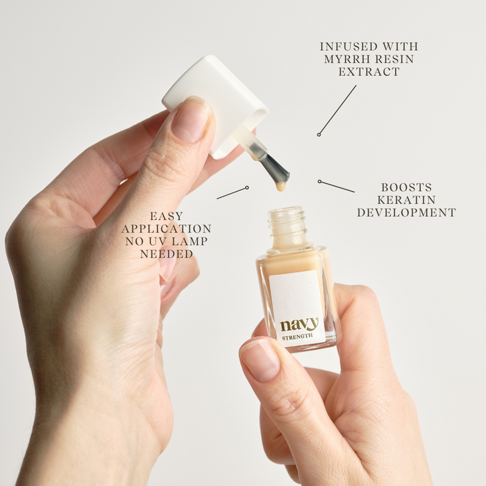 Picture of Strength nail treatment with lid off. Infused with resin extract which boosts keratin development