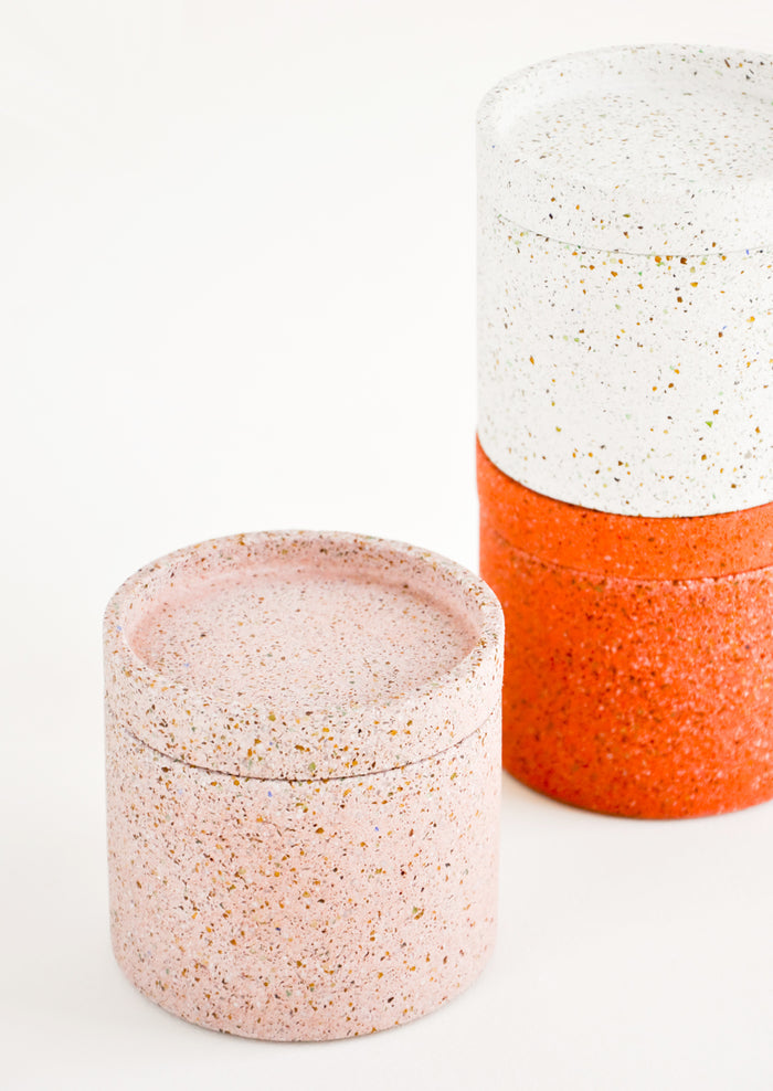 Stack of Colored Concrete Storage Jars with Speckled Glass Flecks
