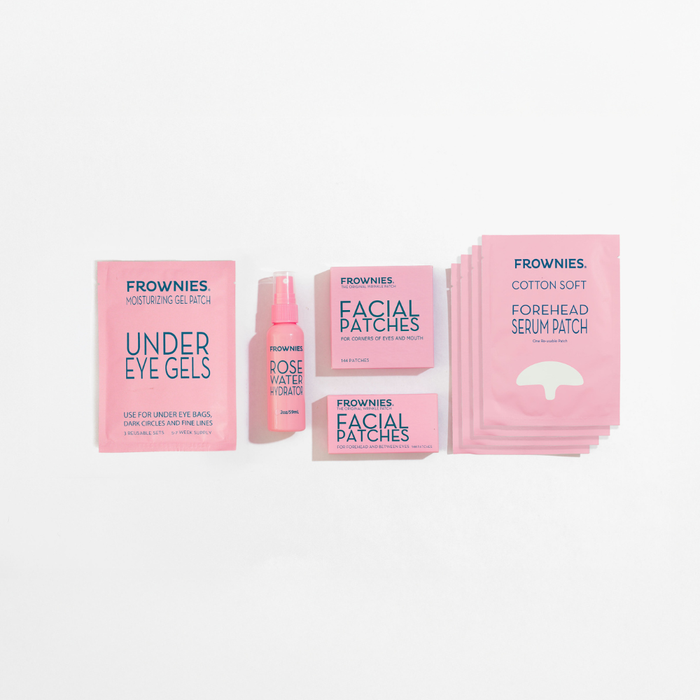 Collection of Frownies skincare products and facial patches on a white background
