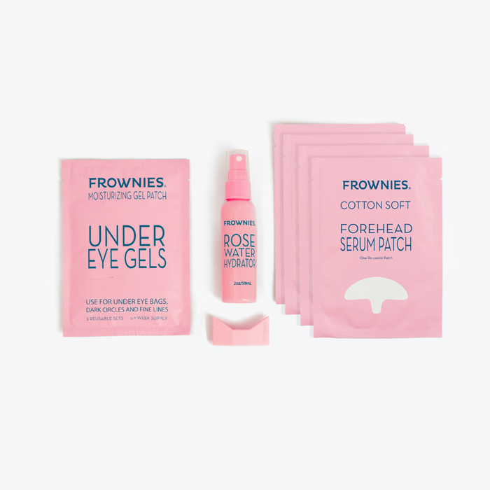 Frownies skincare products including under eye gels, rose water hydrator spray, Wrinkie straw tip, and forehead serum patches on a white background
