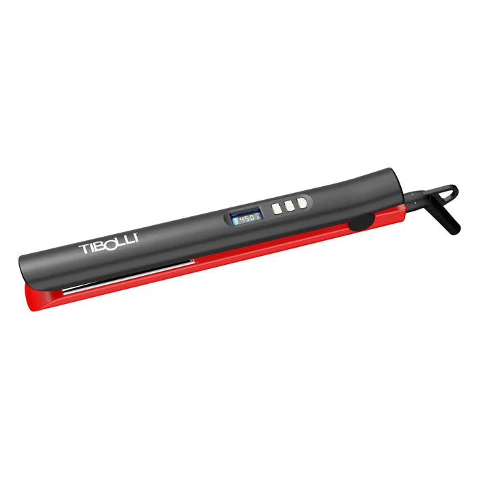 Tibolli Ti22+ Titanium Flat Iron closed with the tip angled down to the left, Tibolli logo on the barrel and display at 450°F
