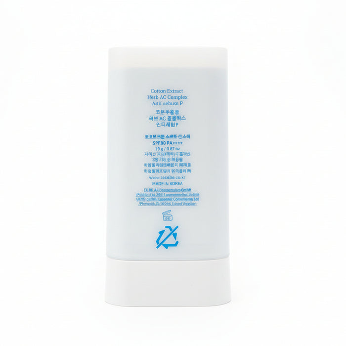 White tube with blue text on a dark background