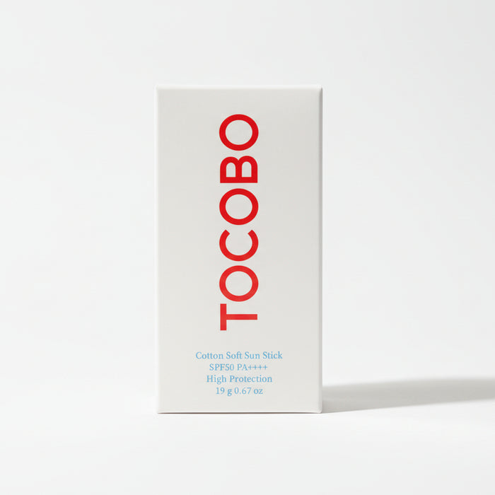 Tocobo sunscreen stick packaging on a dark background