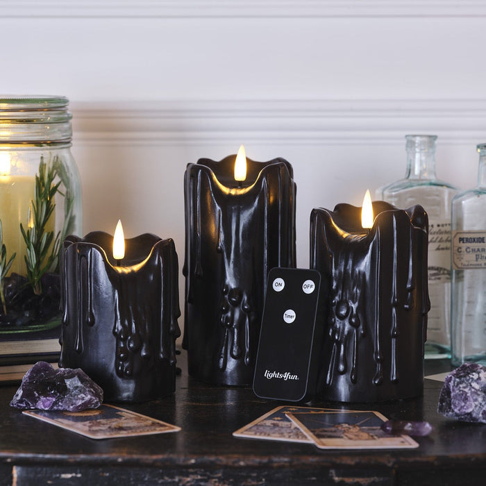 CA24036_4_-3BlackHeavyDrippingWaxTruGlow_Candles.jpg