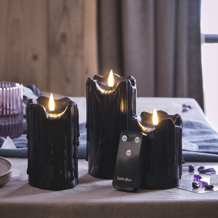CA24036_2_-3BlackHeavyDrippingWaxTruGlow_Candles.jpg