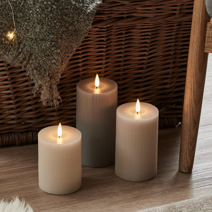 CA22008-TruGlow®-Grey-Ribbed-LED-Pillar-Candle-Trio.jpg