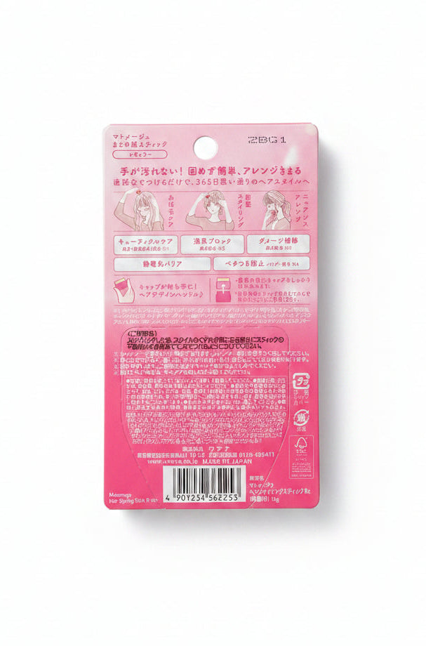 Pink label with text and graphics on a dark surface