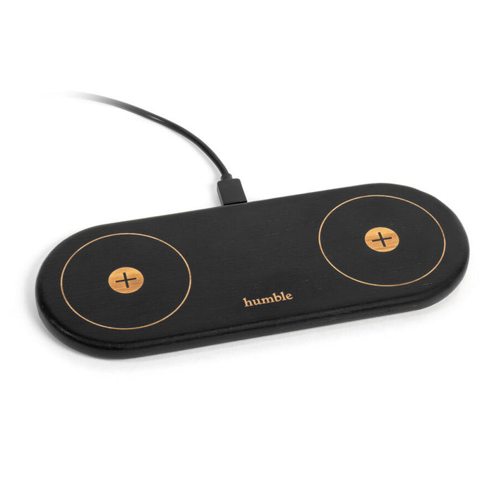 Black wireless charging pad with 'humble' branding on a white background