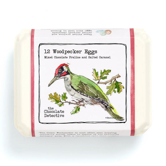 Bar of soap with a woodpecker illustration on a white background